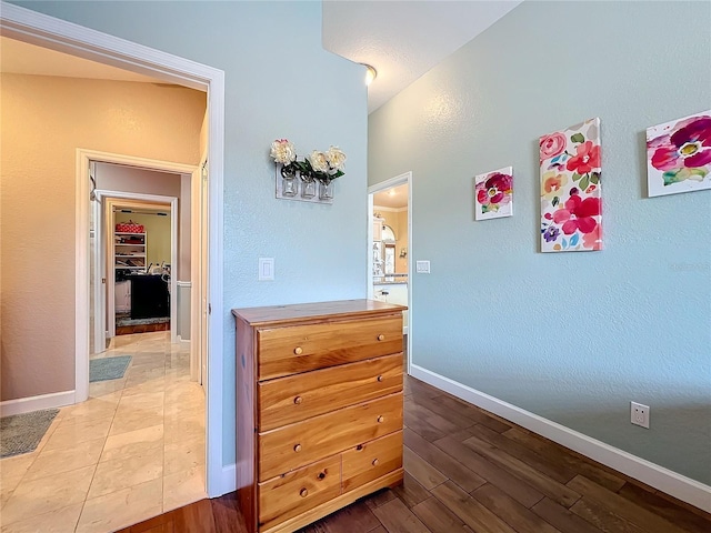 hall with light hardwood / wood-style floors