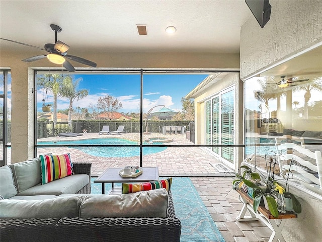 view of pool with ceiling fan