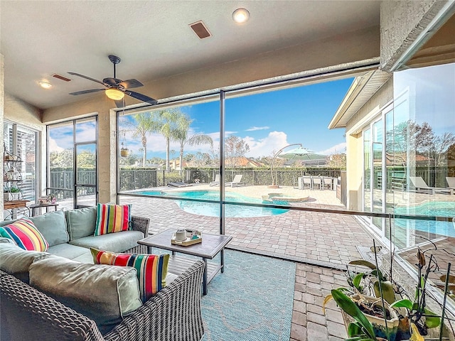 interior space featuring ceiling fan