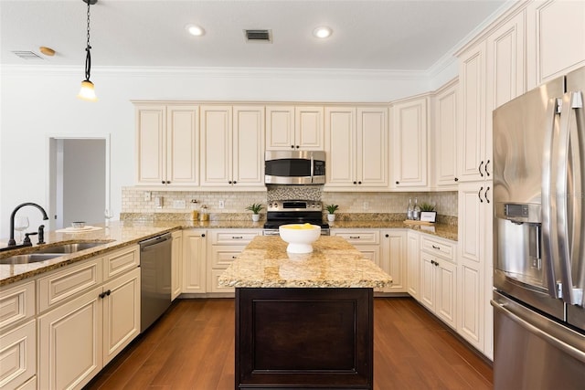 278 Eaglet Way, Lake Mary, FL 32746 - kitchen with stainless steel appliances, a sink, ornamental molding, light stone countertops, and backsplash