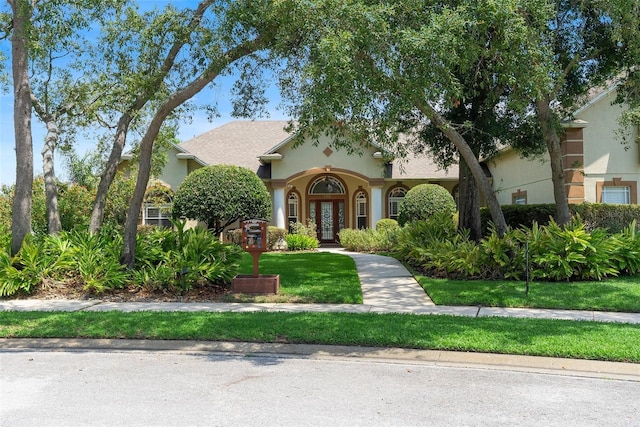 278 Eaglet Way, Lake Mary, FL 32746 - view of front of house with french doors and stucco siding