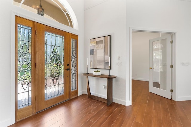 278 Eaglet Way, Lake Mary, FL 32746 - entryway featuring wood finished floors, baseboards, and french doors