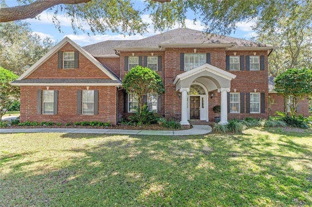 view of front of home featuring a front yard