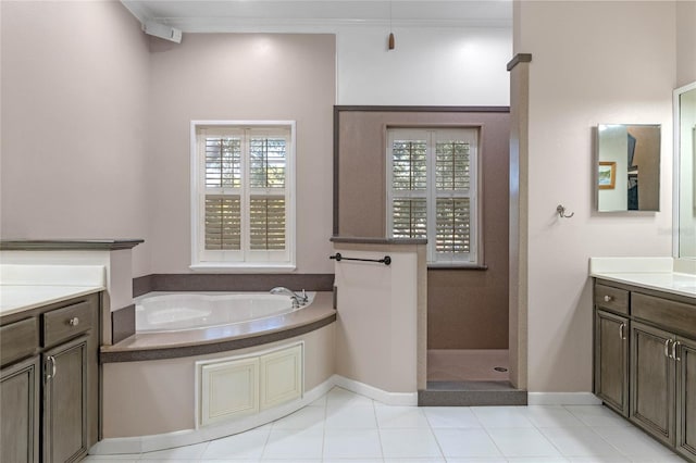 bathroom with vanity, tile patterned flooring, crown molding, and shower with separate bathtub