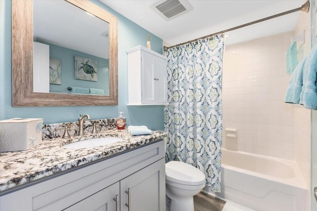 full bathroom featuring vanity, toilet, and shower / bathtub combination with curtain