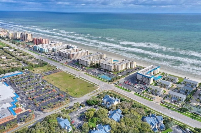 bird's eye view with a beach view and a water view