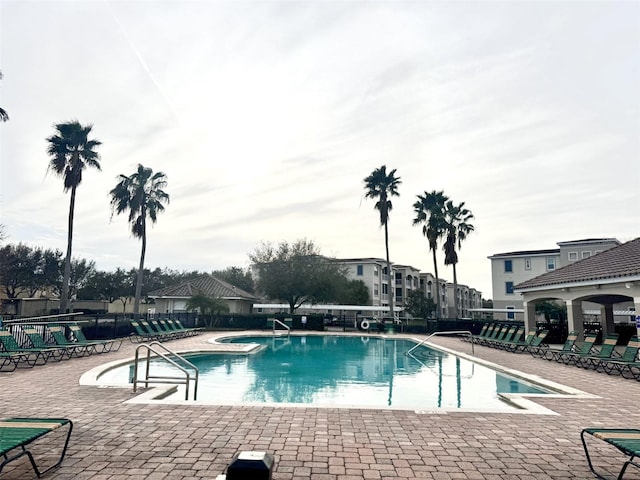 view of swimming pool featuring a patio