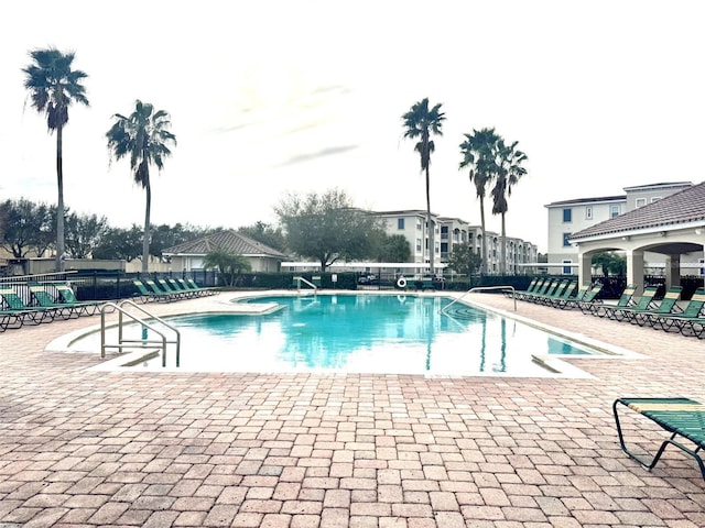 view of pool featuring a patio