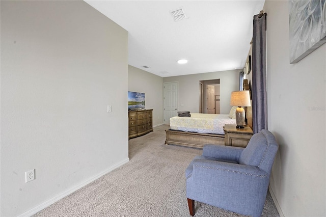 bedroom featuring light colored carpet