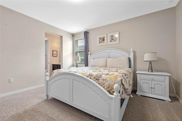 carpeted bedroom featuring connected bathroom