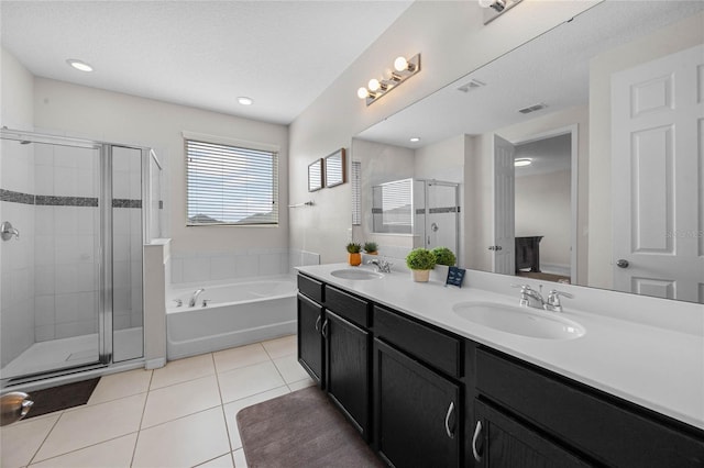 bathroom with vanity, separate shower and tub, and tile patterned flooring