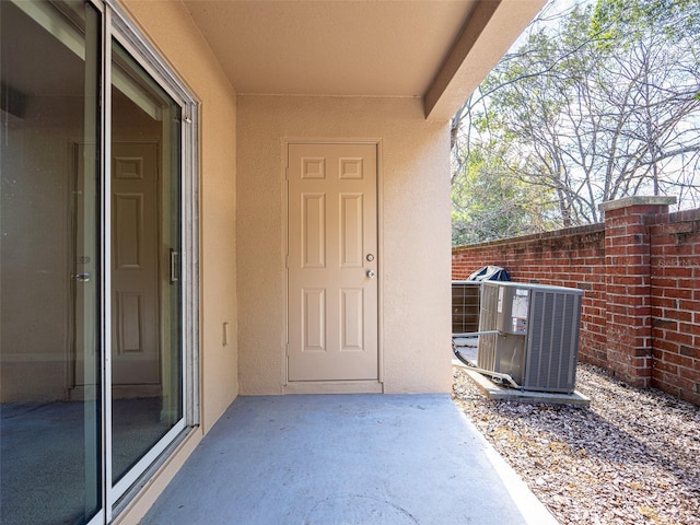 property entrance featuring central air condition unit