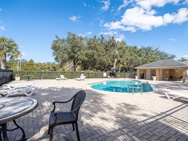 view of swimming pool featuring a patio