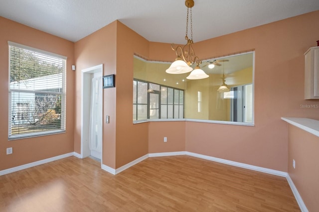 unfurnished dining area with hardwood / wood-style flooring