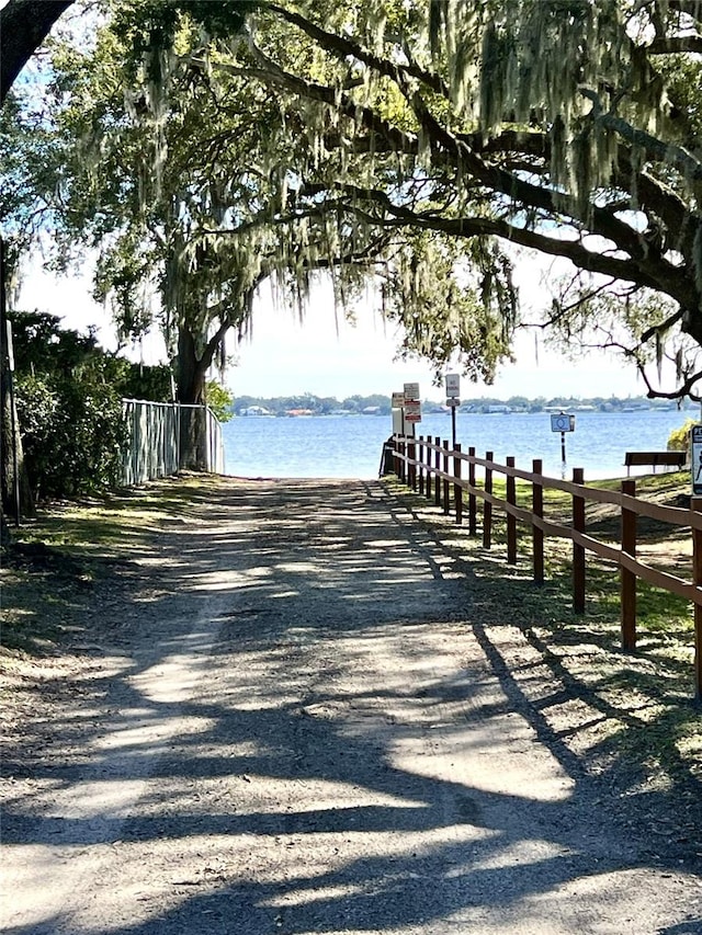 view of home's community with a water view