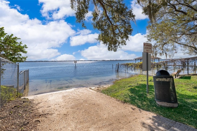 dock area featuring a water view