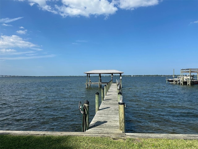 view of dock with a water view