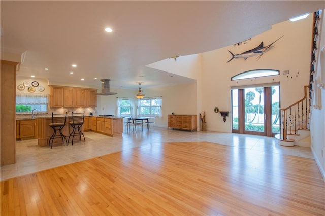 living room with light hardwood / wood-style flooring