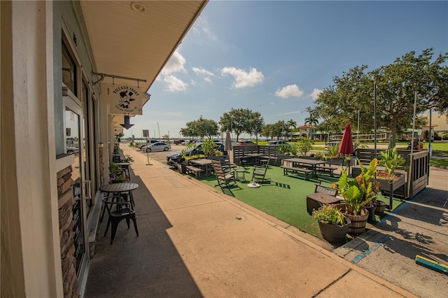 view of home's community with a patio area