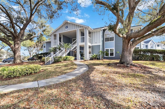 view of front of home with a sunroom