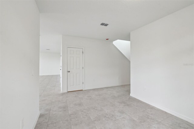 bonus room featuring visible vents and baseboards