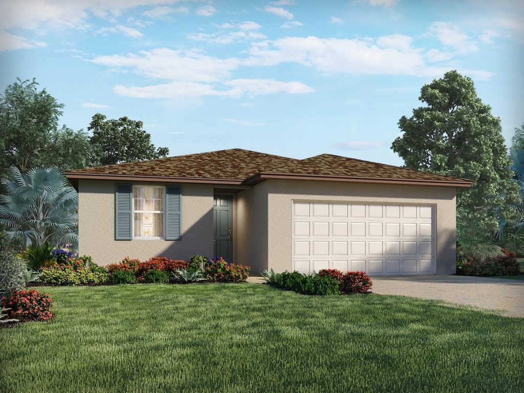 view of front of home featuring a garage and a front yard