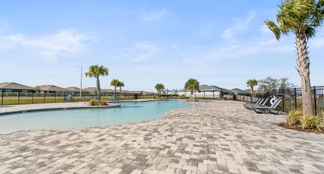 view of swimming pool featuring a patio area