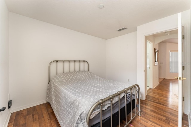 bedroom featuring hardwood / wood-style flooring