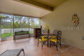 sunroom with beam ceiling