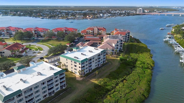 drone / aerial view with a water view