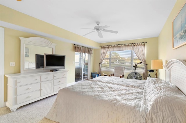 bedroom featuring ceiling fan and light colored carpet