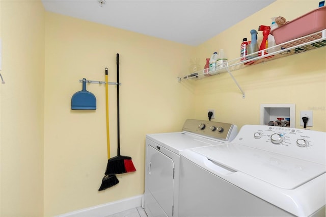 laundry room with washer and clothes dryer