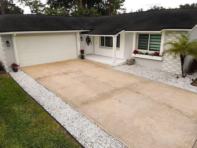 single story home featuring a garage