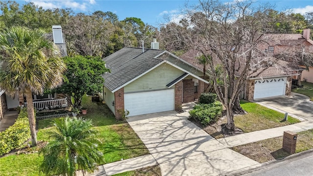 view of front of home with a garage and a front yard