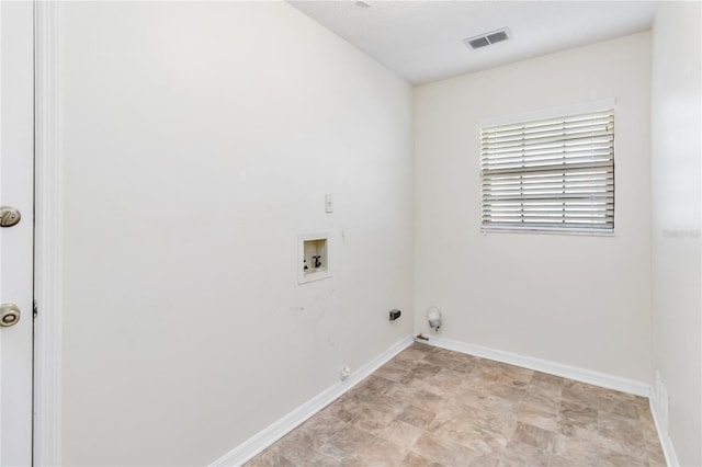 laundry room with gas dryer hookup and washer hookup