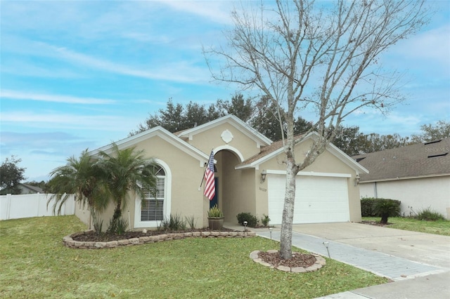 ranch-style home featuring a garage and a front lawn