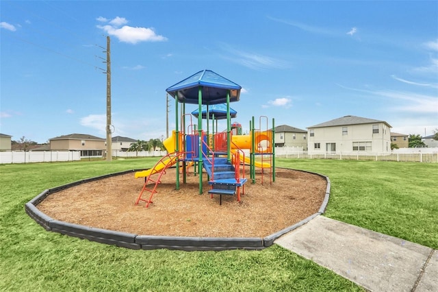 view of play area featuring a lawn