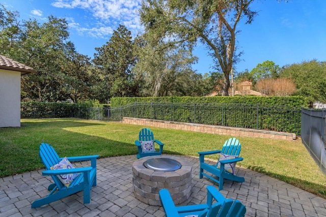 view of patio / terrace with an outdoor fire pit