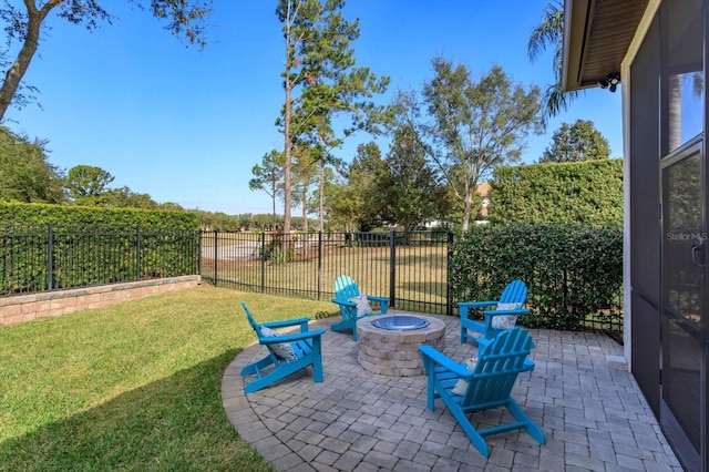 view of patio / terrace with a fire pit