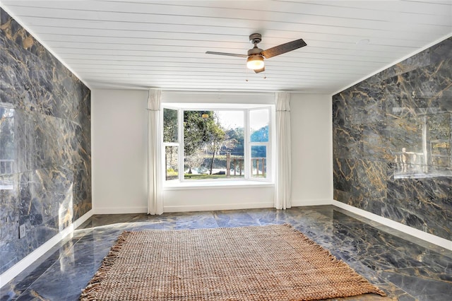 unfurnished room featuring tile walls, wooden ceiling, and ceiling fan