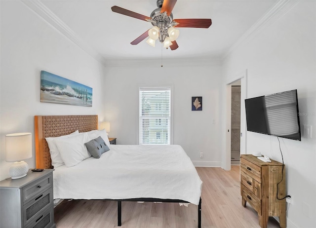 bedroom featuring ceiling fan, light hardwood / wood-style flooring, and ornamental molding