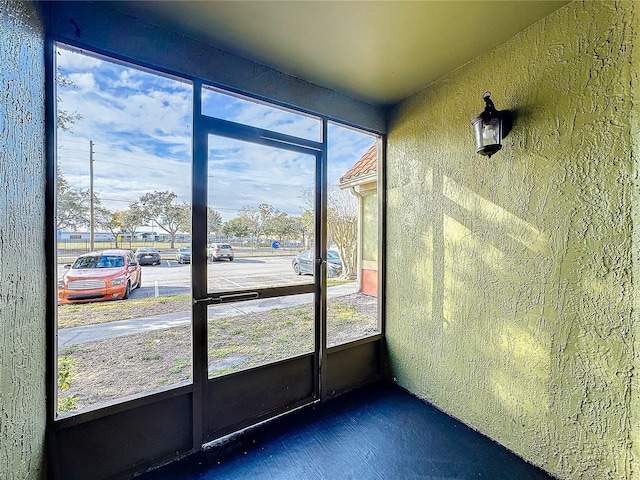 view of unfurnished sunroom