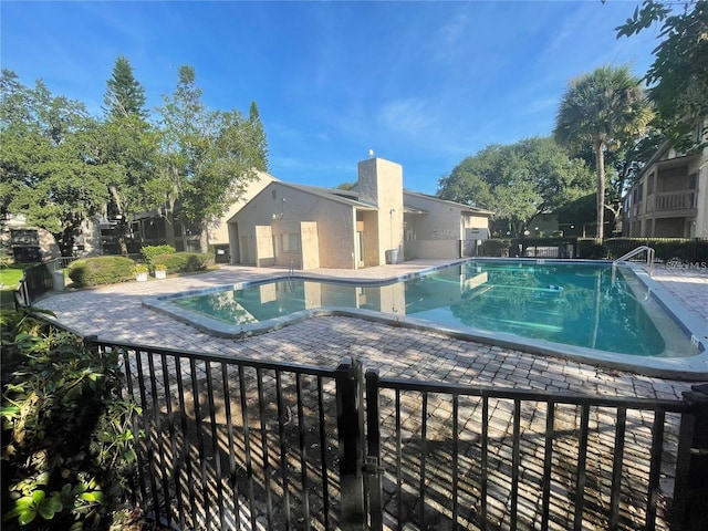 view of pool featuring a patio area