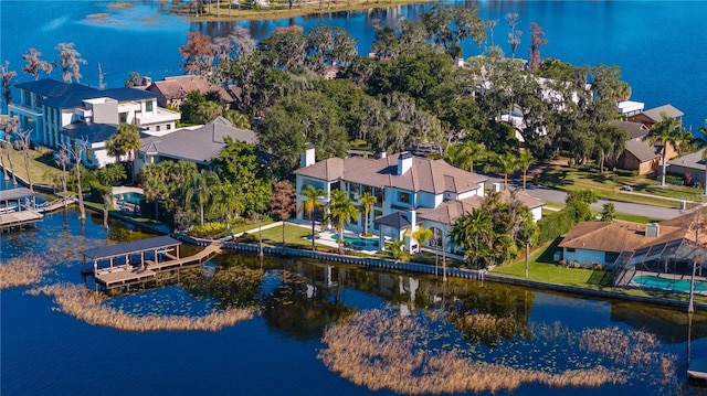 birds eye view of property featuring a water view