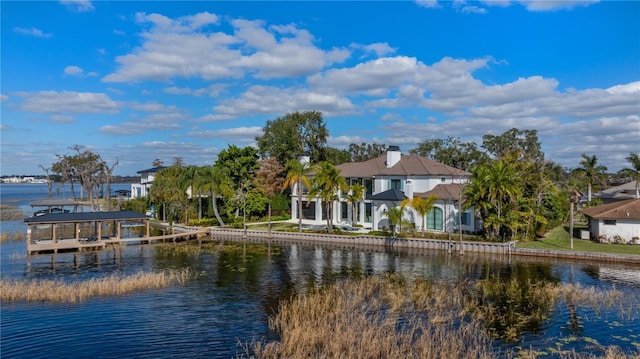 property view of water with a boat dock