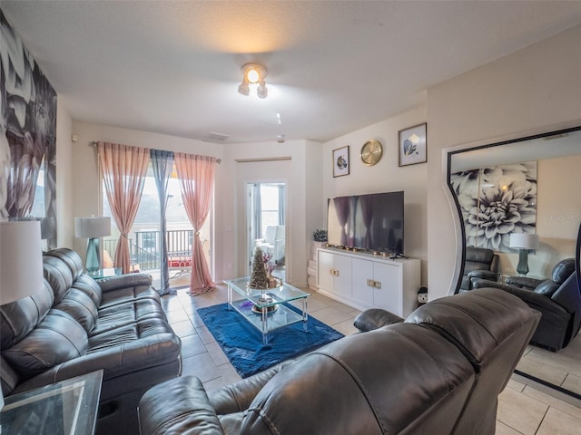 living room featuring light tile patterned floors