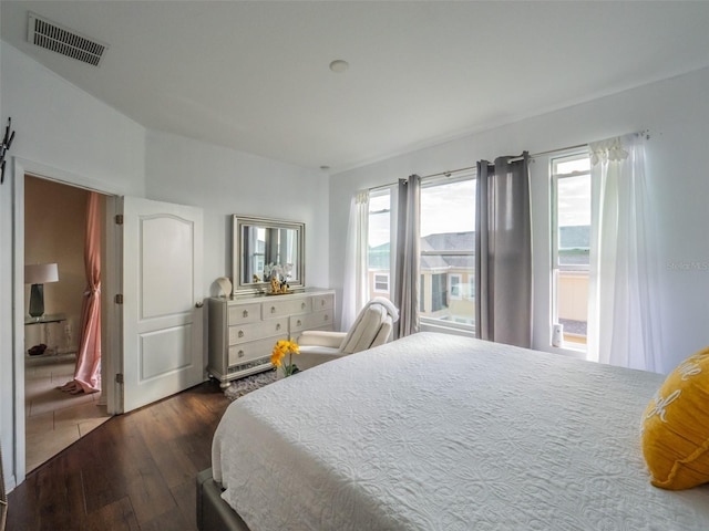 bedroom featuring dark hardwood / wood-style floors