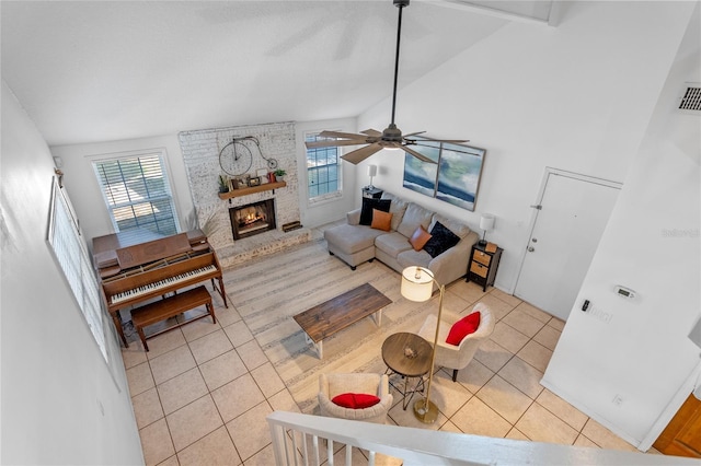 1254 Seminola Blvd, Casselberry, FL 32707 - living area featuring light tile patterned flooring, plenty of natural light, a fireplace, and lofted ceiling