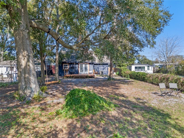 1254 Seminola Blvd, Casselberry, FL 32707 - view of yard with a wooden deck