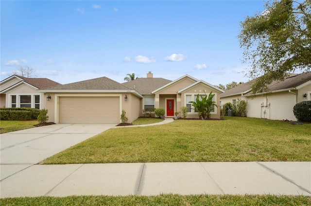 ranch-style house with a garage and a front lawn